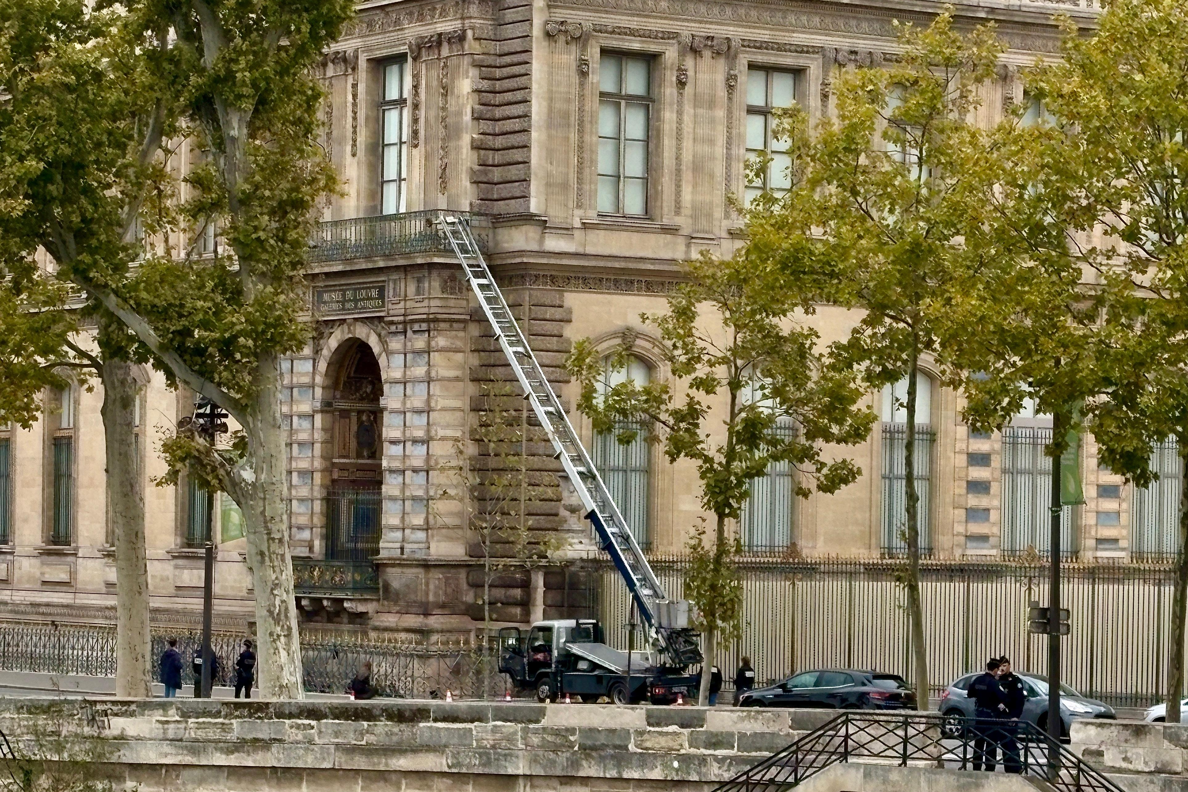A basket lift used by thieves is seen at the Louvre museum on Sunday in Paris.